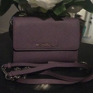 MK sling wallet
